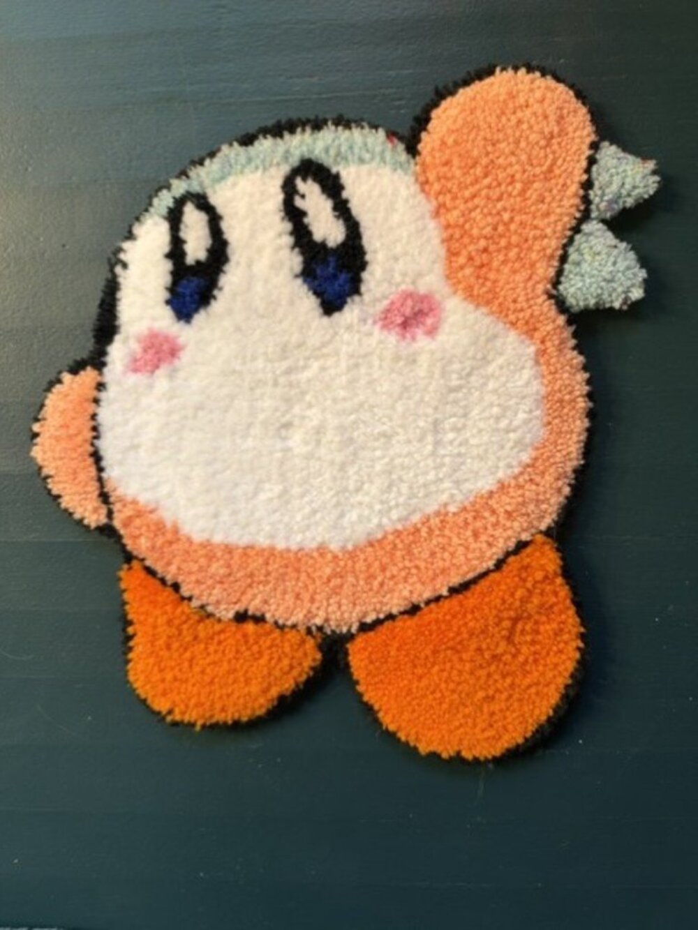 Handmade orange kirby carpet